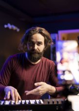 musical-instructor-teaching-piano-lessons-online-social-media-channel